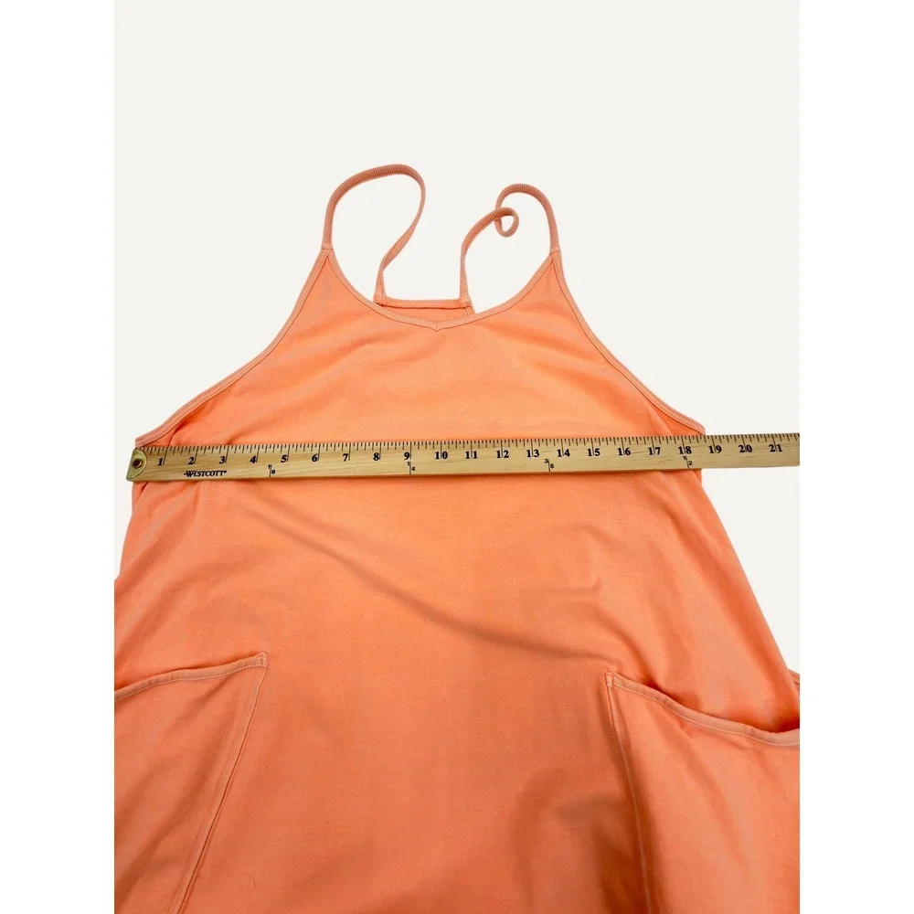 FP Movement Hot Shot Jumpsuit M Peach Boho Romper Pockets Racerback Yoga Comfy